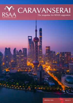 Forces reshapig Asia's economies. Cover image: Aerial view of Shanghai skyline with winding river at sunrise.